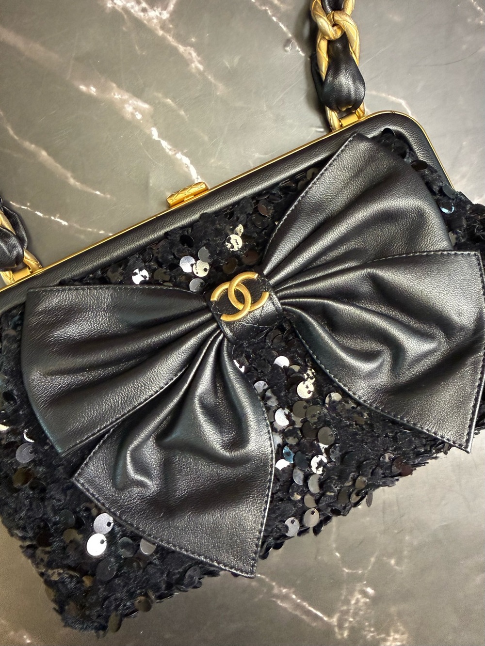 CHANEL Black Sequin Bow Wristlet with Gold Hardware